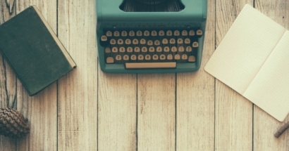 typewriter, book and desk